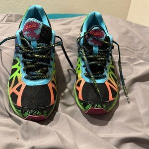 Women’s worn ASICS.